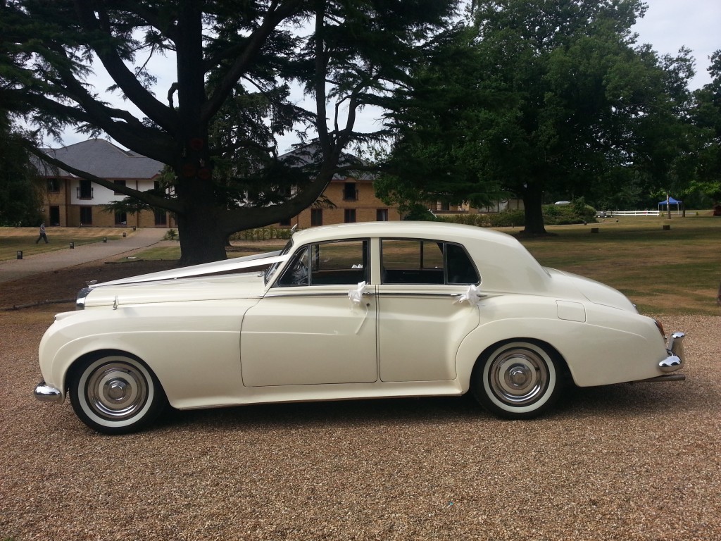 The elegant Bentley S1 available for wedding hire, shown from the side.