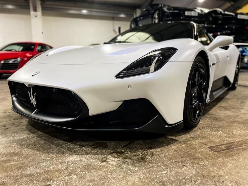 Another angle of the Maserati MC20, available as cars to hire.