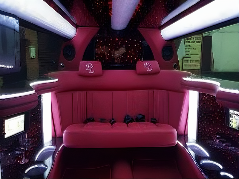 Plush leather seats and elegant interior of a Rolls Royce Phantom Limo, ideal for a romantic Valentine's Day journey.